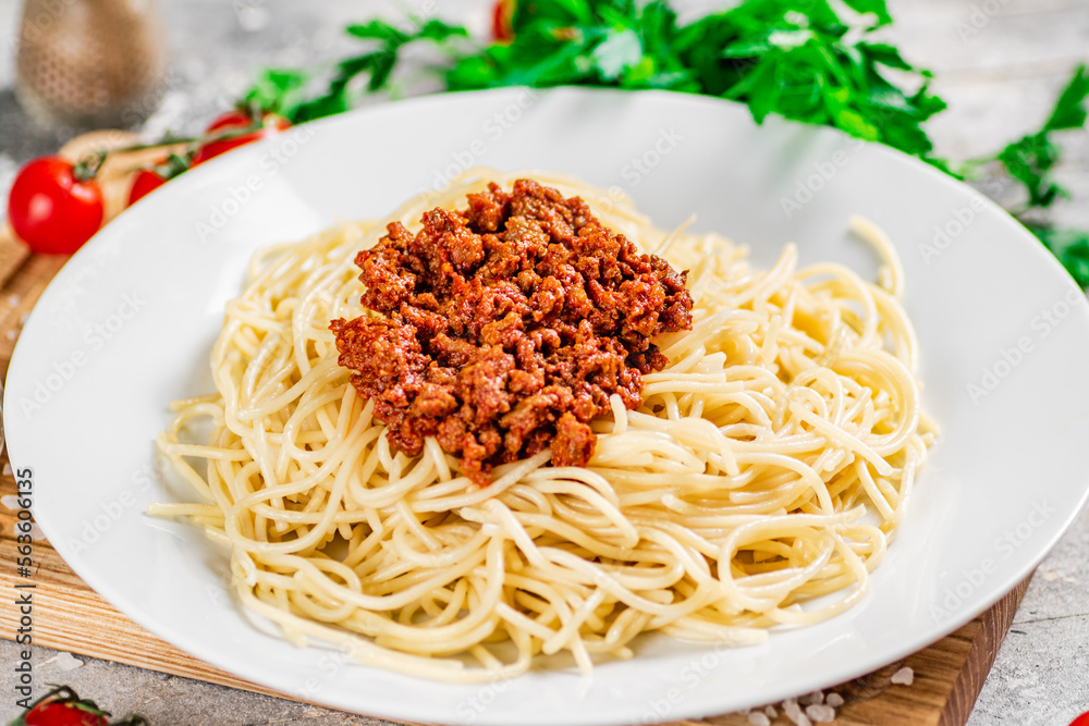 Delicious spaghetti bolognese with parsley. Delicious spaghetti bolognese with parsley.