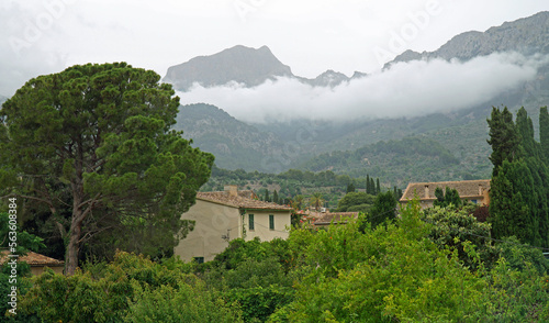 View of Soller Mallorca with low cloud in front of Tramuntana mountains 