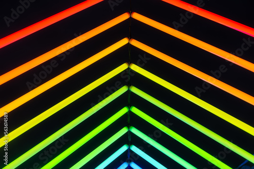 Neon lights as a background. Installation of neon lines for the design. An art installation of colored lights. Photo in high resolution.