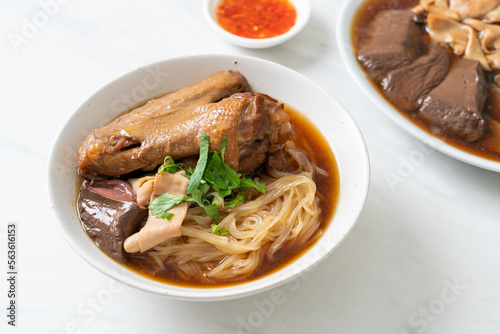 Braised duck noodles with brown soup