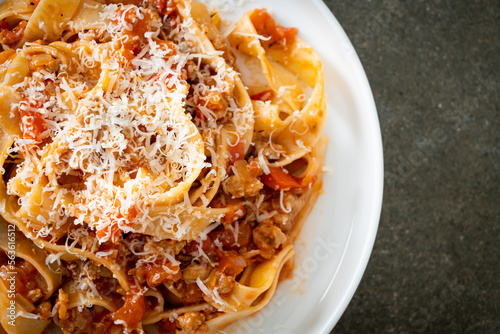 Homemade pasta fettuccine bolognese with cheese