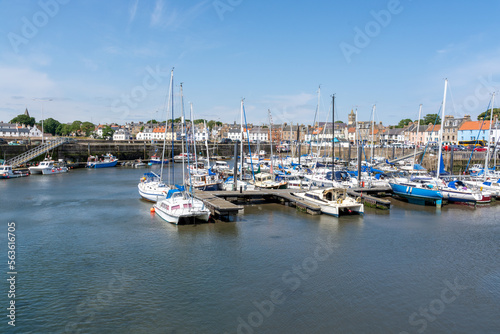 Anstruther, United Kingdom - July 16, 2022: Harbour with boats on a sunny day