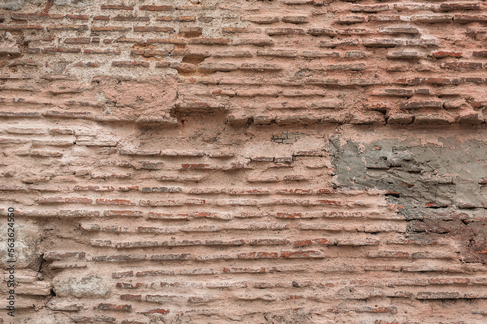Grunge wall background with old brick stones texture