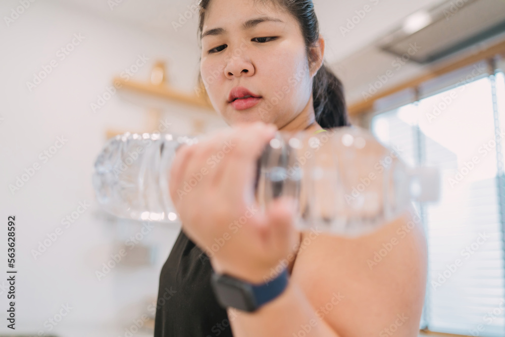 fat-woman-using-water-bottle-exercise-to-save-environment-thoughtful