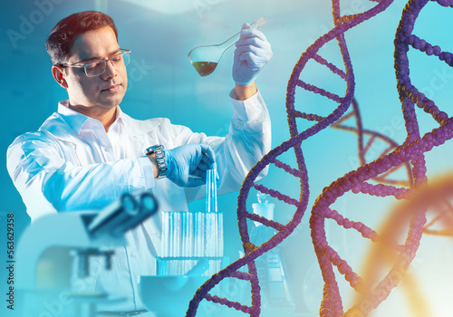 Man geneticist looks at his...