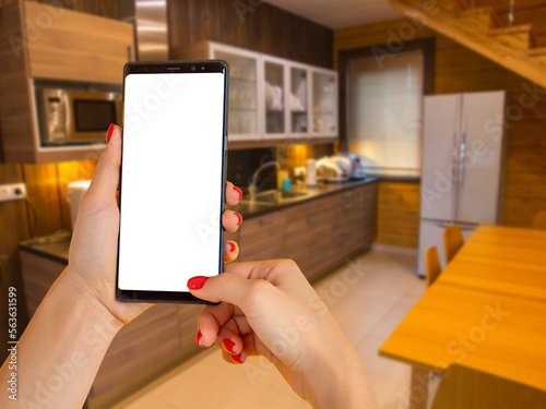 Phone is in hands of woman....