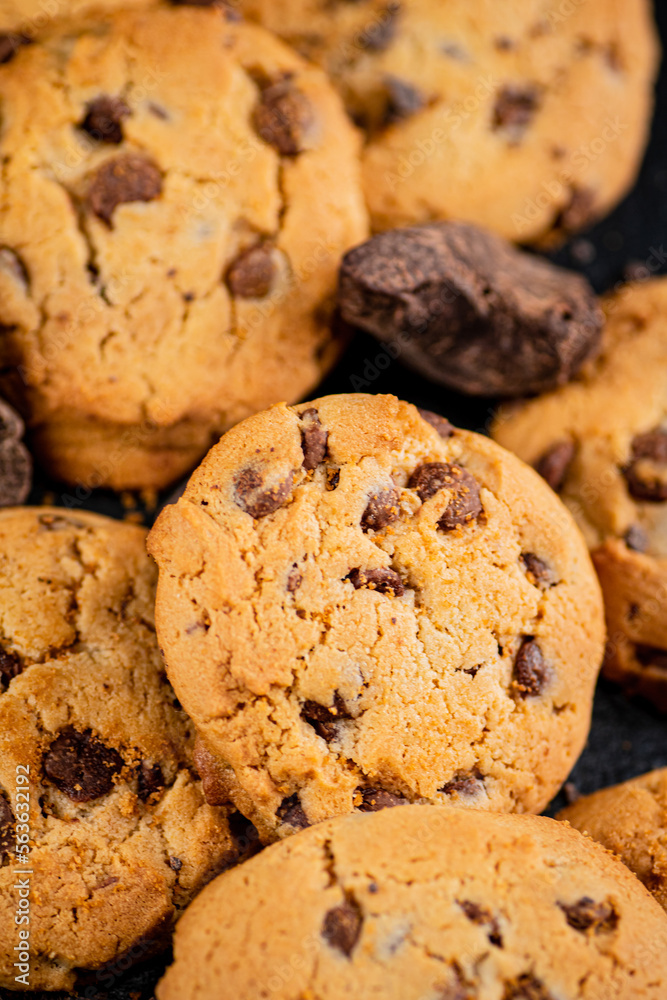 Cookies with pieces of milk chocolate on the table. Cookies with pieces of milk chocolate on the table.