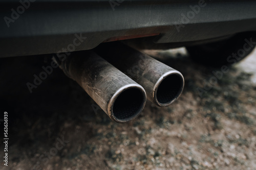 Two exhaust pipes of a sports car close-up. Photography, tuning.