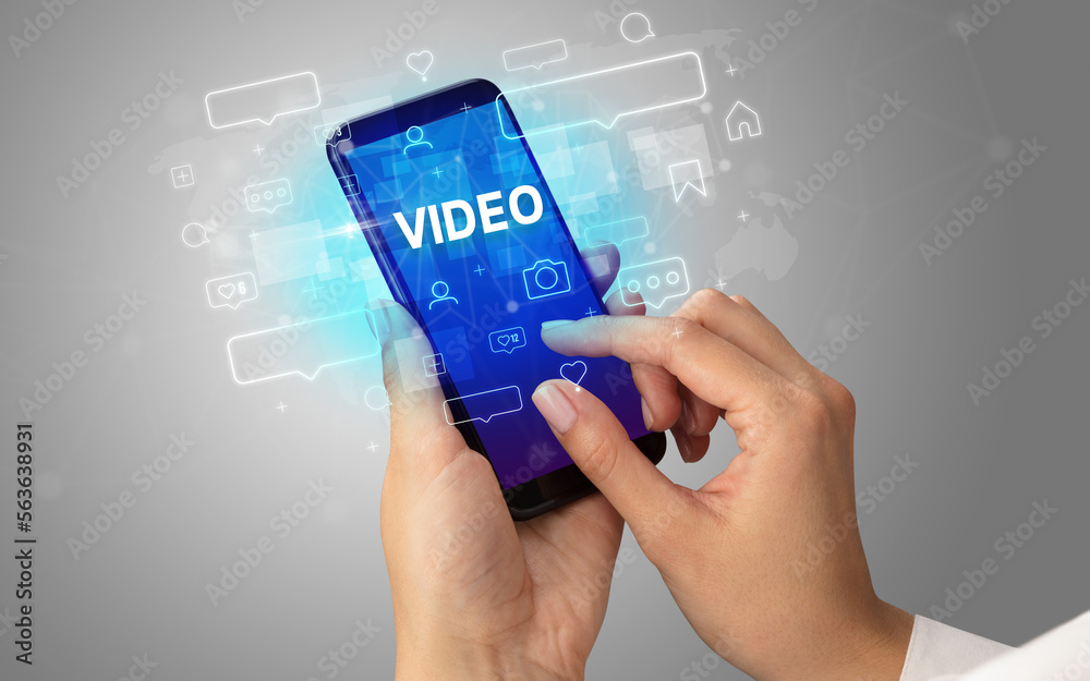 Hand using smartphone with social media concept Hand using smartphone with social media concept