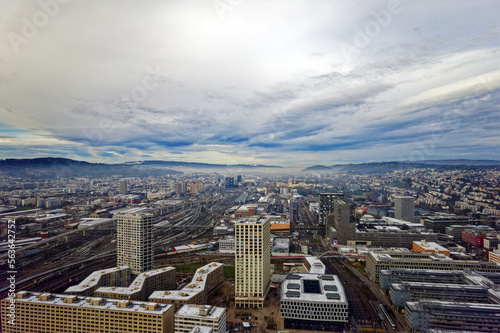 Aerial view of City of Zürich seen from industrial district with North District in the background on a cloudy winter day. Photo taken December 20th, 2022, Zurich, Switzerland.