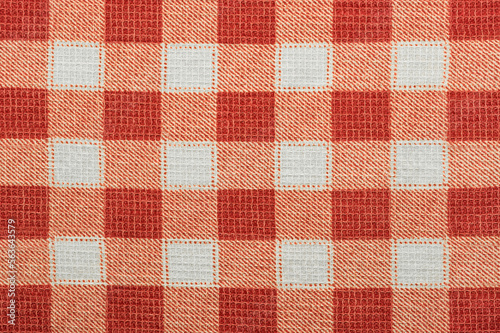 Cotton fabric with a square pattern of red tone