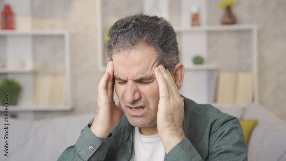 Mature man with medical health problem has a headache.
Mature man with health problems has severe headache at home.
Mature man with medical health problem has a headache.
Mature man with health problems has severe headache at home.