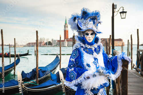 Beautiful colorful masks at traditional Venice Carnival in Venice, Italy © smallredgirl