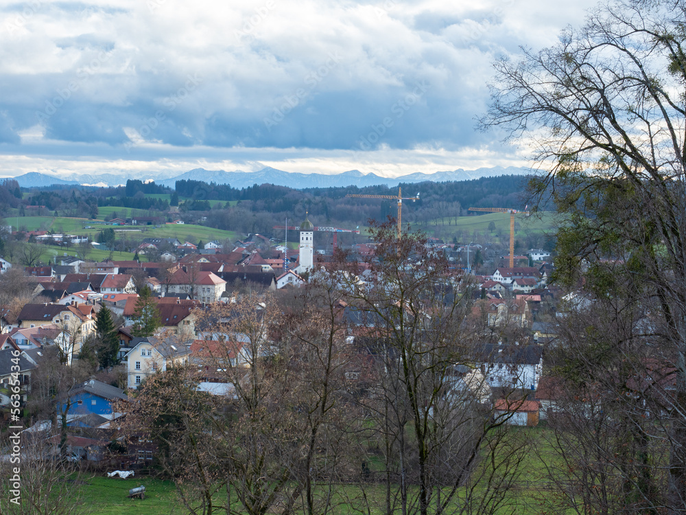Fototapeta premium Andechs, Germany - December 27th 2022: View from the monastery hill towards the village and the Alps