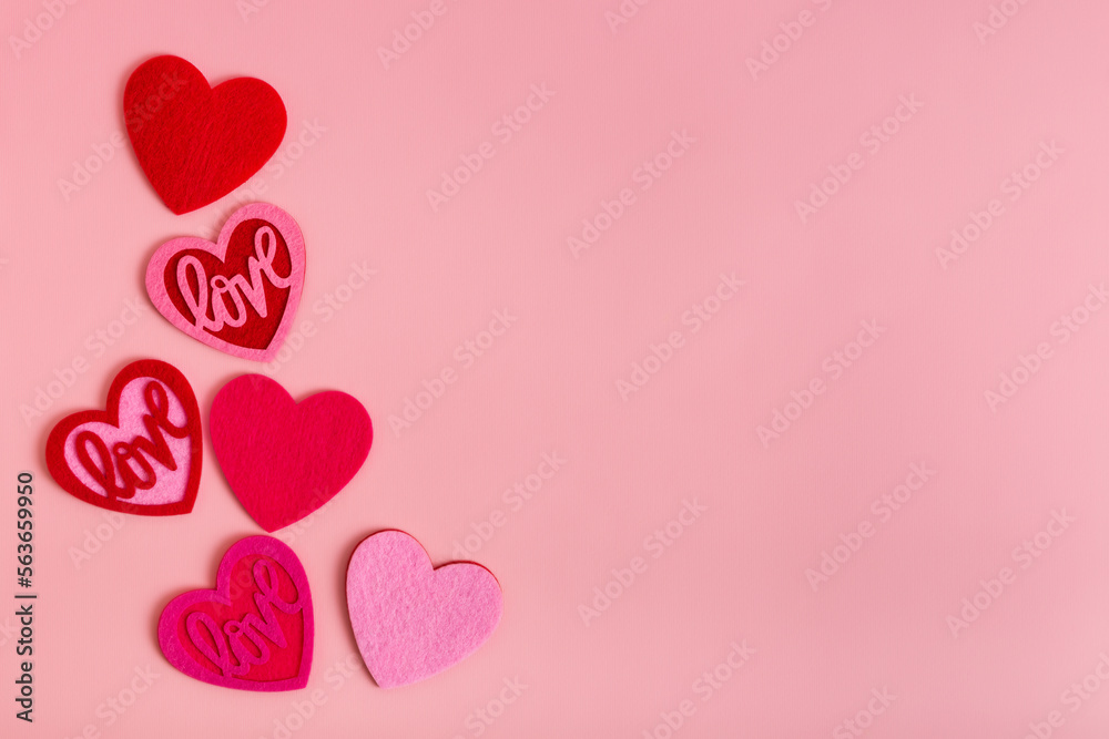 Romantic card with set oh hearts from above on pink background. Lovely picture for Valentine's Day.