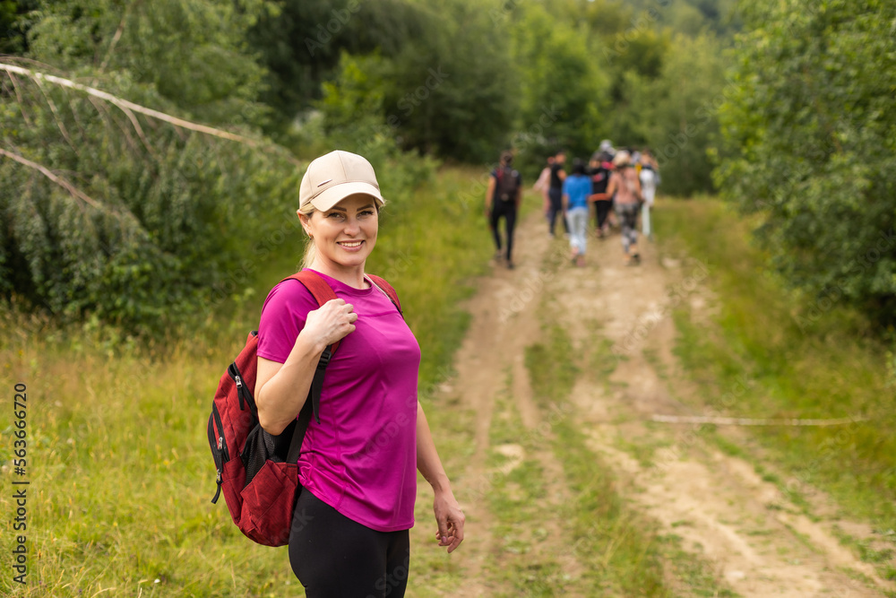 Naklejka premium Fit woman walking on the mountain. Healthy lifestyle concept