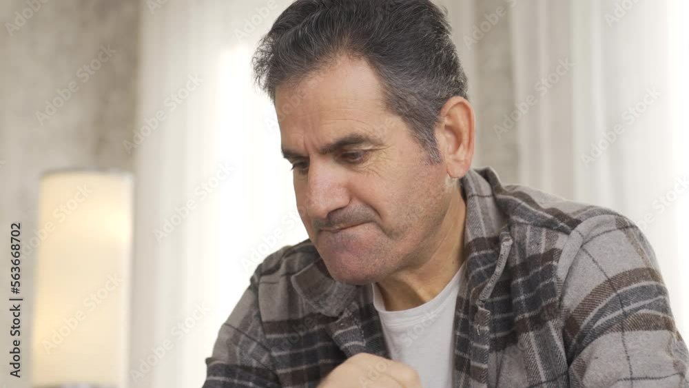 Close-up of lonely, thoughtful and unhappy man playing chess alone.
Mature man living alone and having no one is playing chess.
Close-up of lonely, thoughtful and unhappy man playing chess alone.
Mature man living alone and having no one is playing chess.