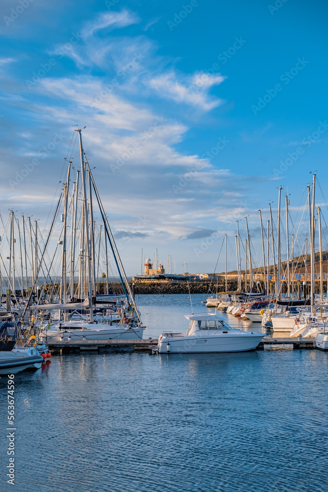 boats in the port with lighthouse at the end, Howth, Dublin, Ireland