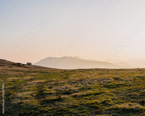 Peaceful sunset over the mountains  golden light  no people  background  Great sugarloaf in Wicklow  Ireland