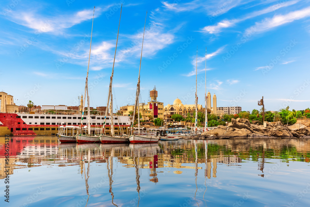 Sailboats in The Nile near the Coptic Orthodox Cathedral of the Archangel Michael, Aswan, Egypt
