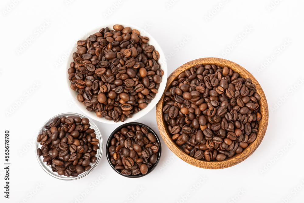 Coffee beans in bowl isolated on white background. Coffee beans in bowl isolated on white background.