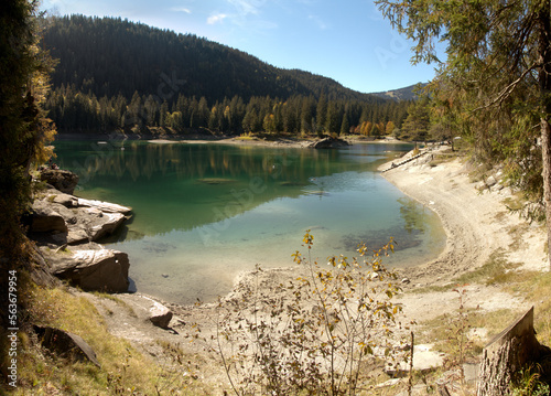 Teal waters of Lake Cauma, jewel of the Swiss Canton of Grisons