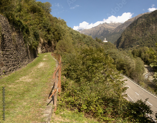 Church of San Martino in Soazza, Swiss Canton of Graubünden, seen from valley footpath photo