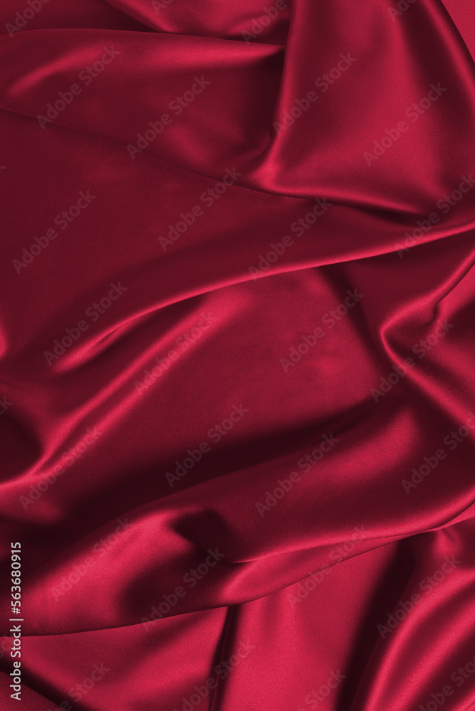 Red silk or satin luxury fabric texture can use as abstract background. Top view. Red silk or satin luxury fabric texture can use as abstract background. Top view.