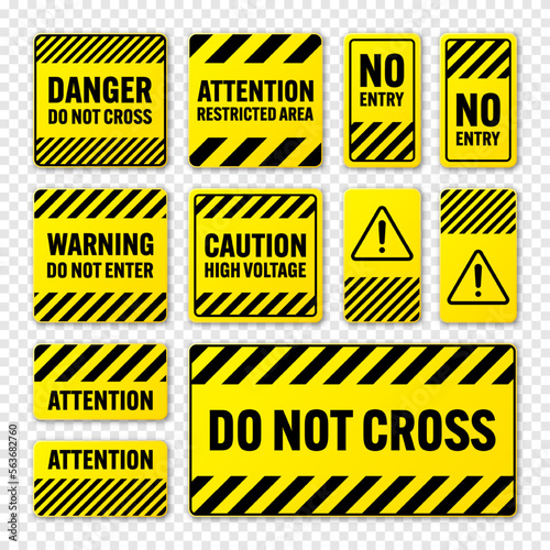 Fotografia Various black and yellow warning signs with diagonal lines
