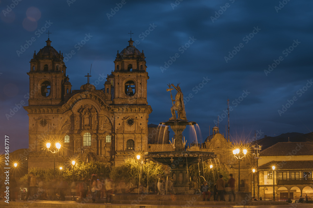 Inca Fountain and Church de la Compania de Jesus  at Main Square - Cusco, Peru, the blue hour
