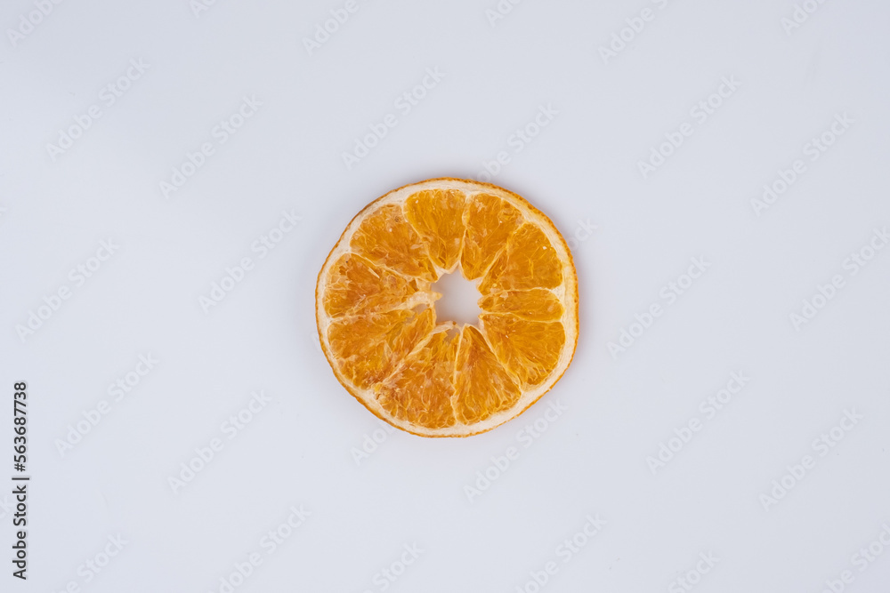 Top View of Dry Orange Slice Isolated on White Background. Top View of Dry Orange Slice Isolated on White Background.
