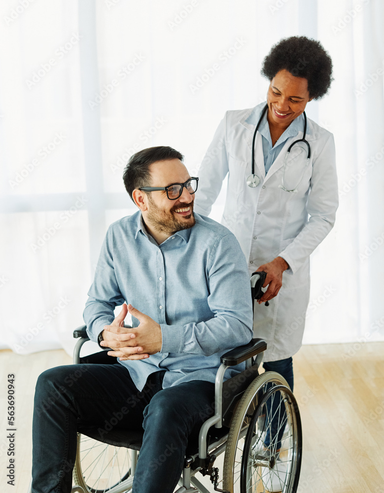 disability wheelchair doctor patient hospital medical disabled man handicap nurse handicapped health young wheel care clinic disability wheelchair doctor patient hospital medical disabled man handicap nurse handicapped health young wheel care clinic