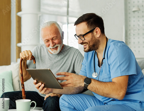 Obraz na plátně nurse doctor senior care tablet computer technology showing caregiver help assis