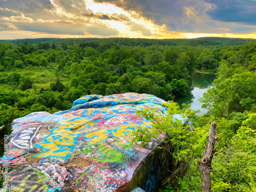 Graffiti landscape with river and trees