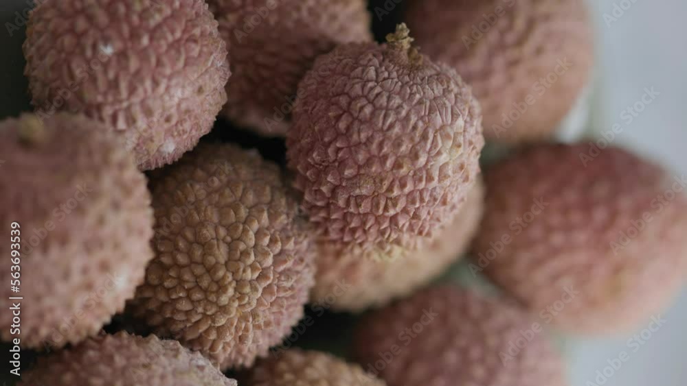 Lychee berries rotate in circle. vertical frame Lychee berries rotate in circle. vertical frame