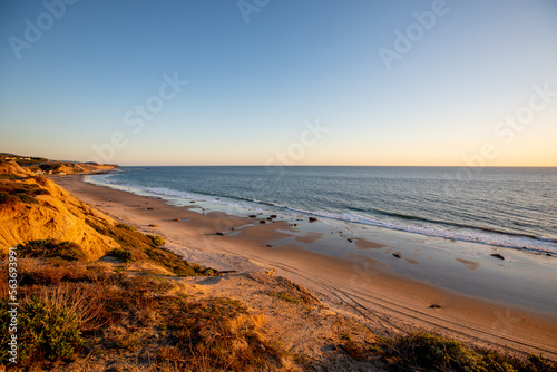 Sunset Time View at Crystal Cove State Beach Shoreline with Ocean Waves  Newport Beach City  California