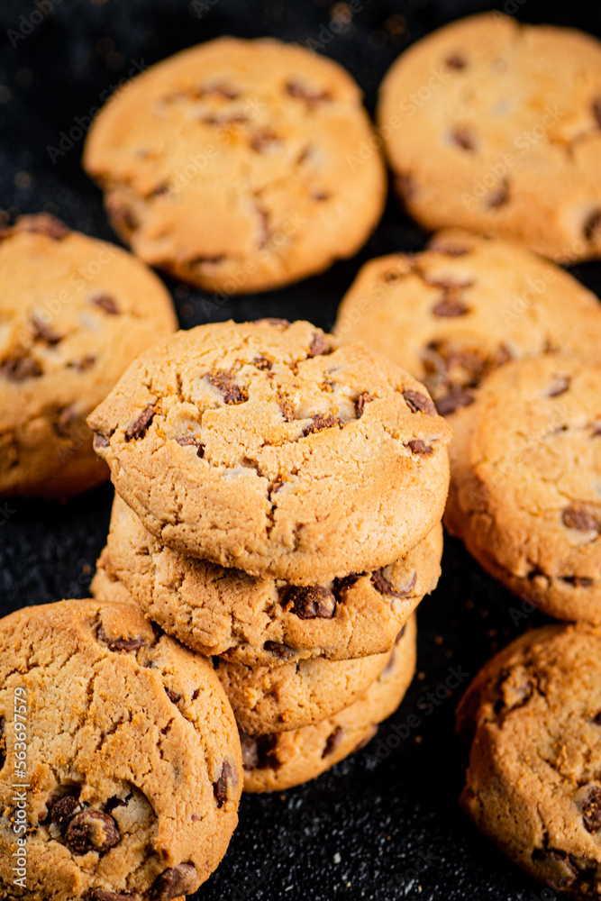 A pile of milk chocolate cookies. A pile of milk chocolate cookies.