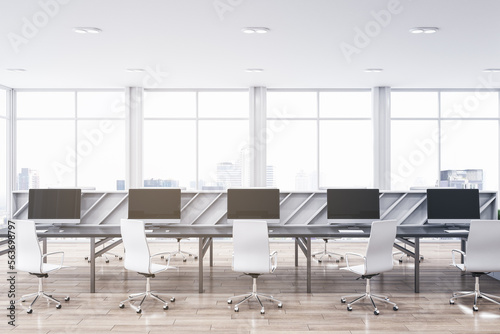 Modern bright coworking office interior. Wooden and concrete materials. Panoramic window with city view and daylight. Corporation  law and legal concept. 3D Rendering.