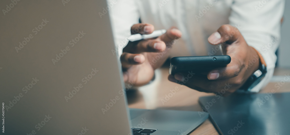 Web banner. Businessman using laptop to analyze business investment. Demonstrates the trend driving digital online shopping.
Web banner. Businessman using laptop to analyze business investment. Demonstrates the trend driving digital online shopping.