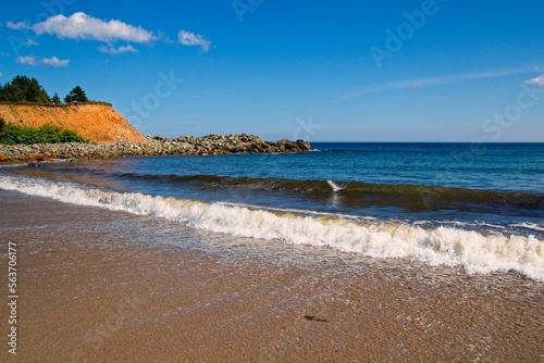 Waves on the beach at Kennington Cove, Cape Breton, Nova Scotia, Canada. photo