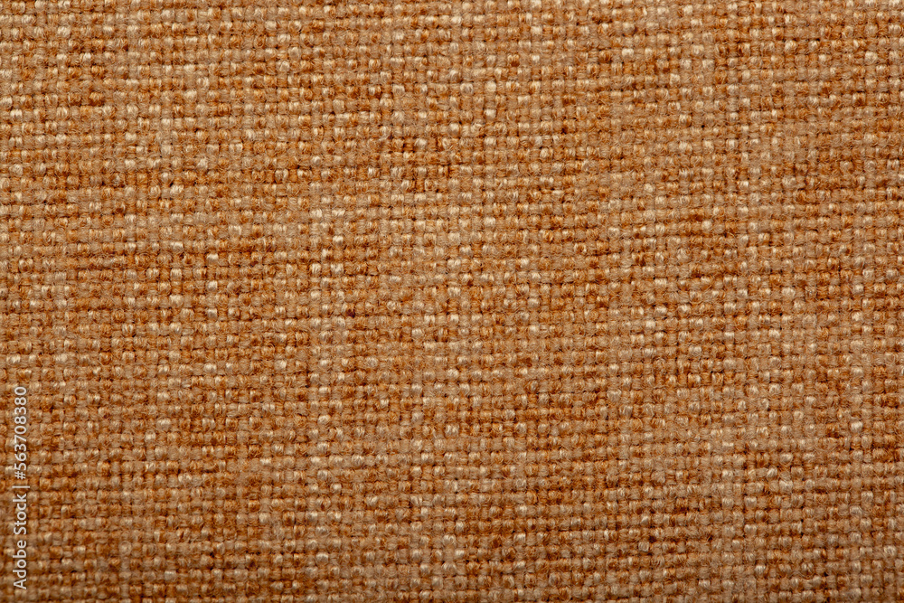 Close-up fabric swatches as a background. The texture of the material with patterns of weaving close-up. Upholstery fabric for interior decoration. Close-up fabric swatches as a background. The texture of the material with patterns of weaving close-up. Upholstery fabric for interior decoration.
