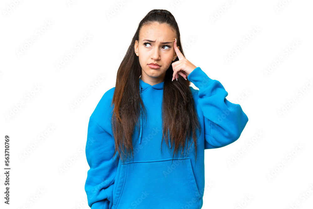 Young Arabian woman over isolated chroma key background making the gesture of madness putting finger on the head Young Arabian woman over isolated chroma key background making the gesture of madness putting finger on the head