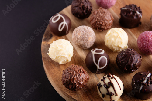 photo chocolates on a wooden board