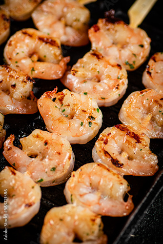 Delicious grilled shrimp. Macro background.