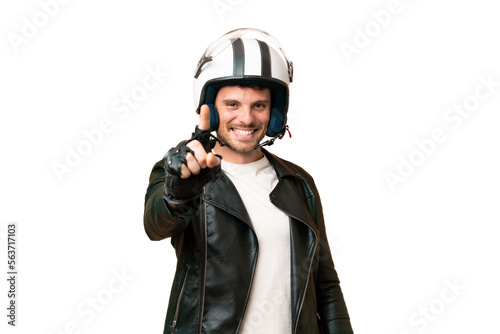 Brazilian man with a motorcycle helmet over isolated chroma key background showing and lifting a finger