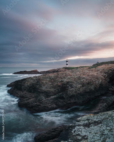 Isla Plancha Lighthouse in Asturias Spain at Sunrise