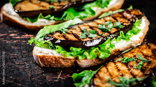 Sandwich with grilled fried eggplant and lettuce. 
