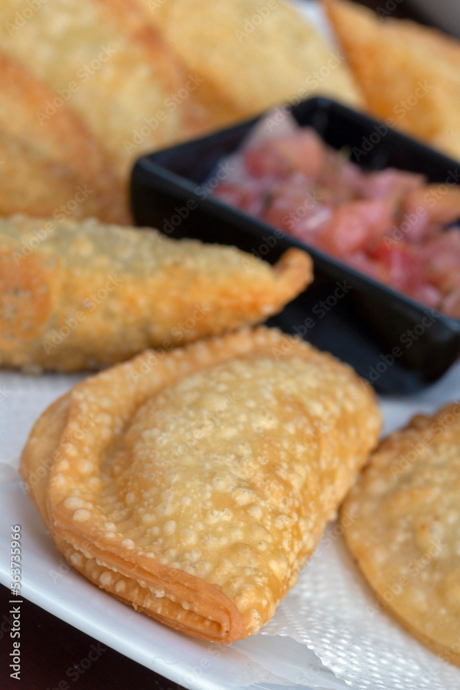 Brazilian bar food: portion of pastel whit vinaigrette Brazilian bar food: portion of pastel whit vinaigrette