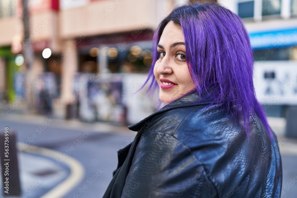 Obraz premium Young beautiful plus size woman smiling confident standing at street