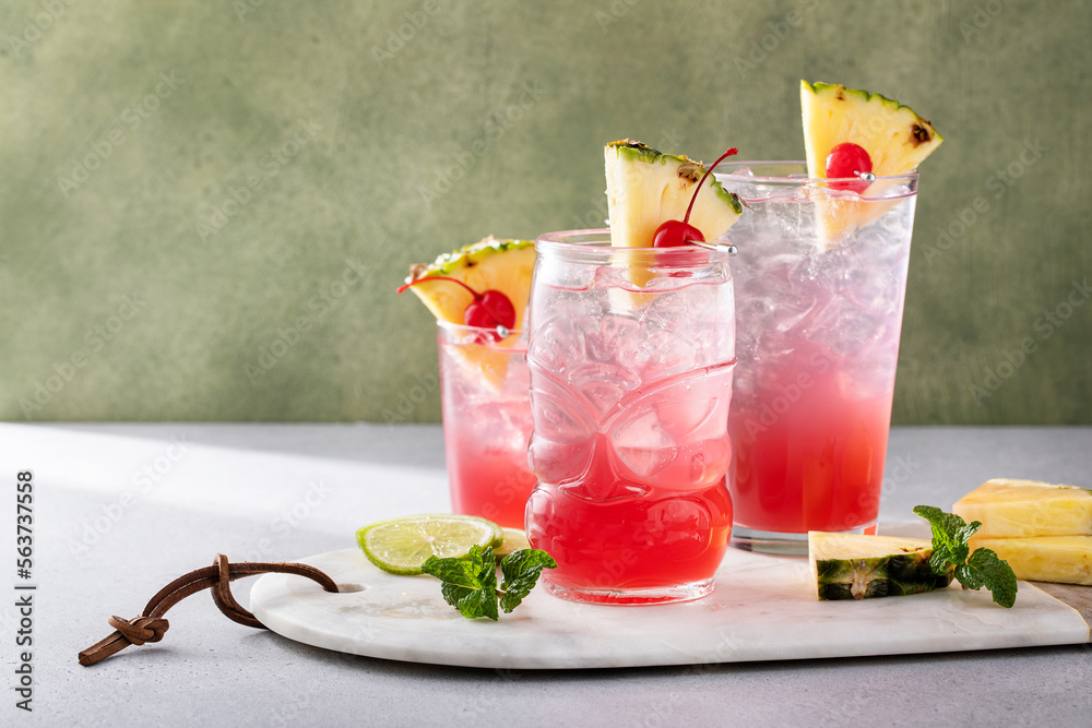 Fototapeta Singapore sling cocktail in variety of glasses